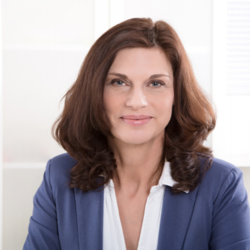 Happy working woman facing the camera